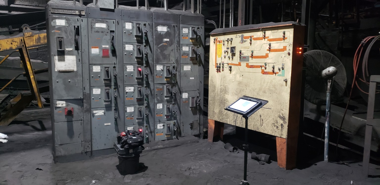 Industrial motor control center and operator board in dusty foundry environment
